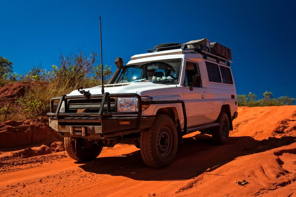White 4x4 Car on Red Sand — Tyres & Mechanical Repairs in Moss Vale, NSW